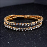 Elegant Crystal Bracelet – Gold-Tone Elastic Bangle