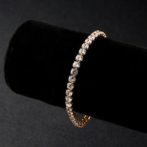 Elegant Crystal Bracelet – Gold-Tone Elastic Bangle