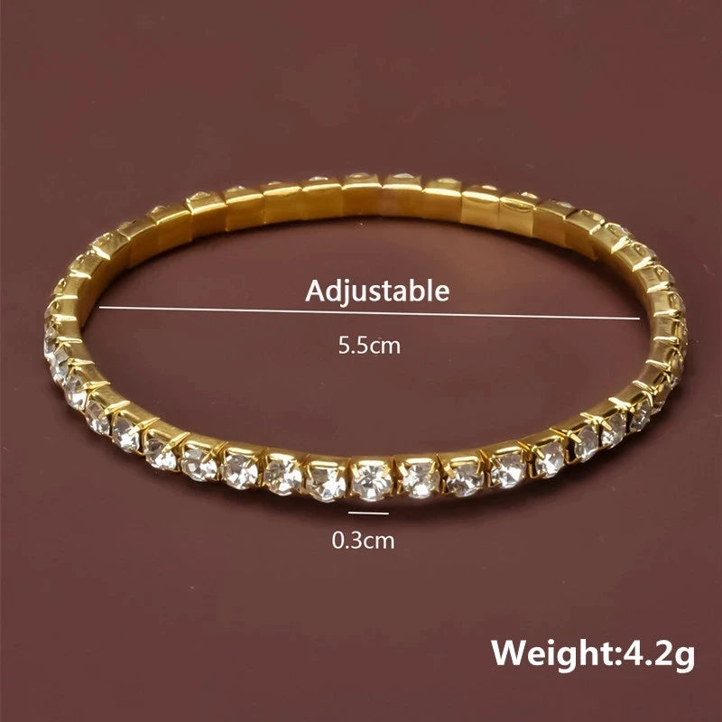 Elegant Crystal Bracelet – Gold-Tone Elastic Bangle